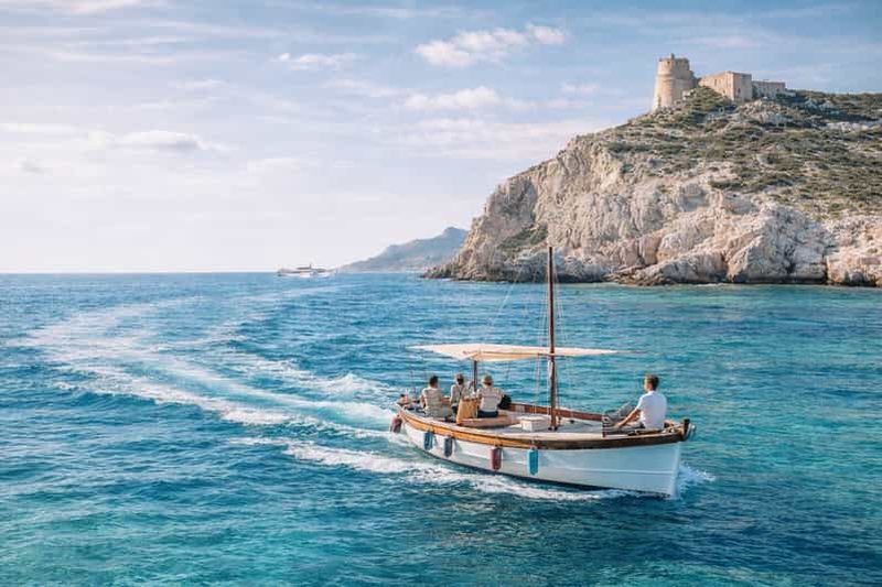 Cagliari : sortie en bateau gozzo à Sella del Diavolo avec apéritif