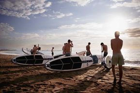Barcelone : Tour de Standup Paddle au lever du soleil avec vidéo 4K et café