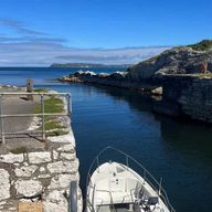 Ballintoy : Visite privée en bateau de l'histoire, de la géologie et du patrimoine
