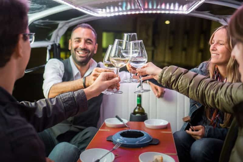 Zurich : Fondue au fromage suisse et visite en e-Tuk-Tuk avec vin